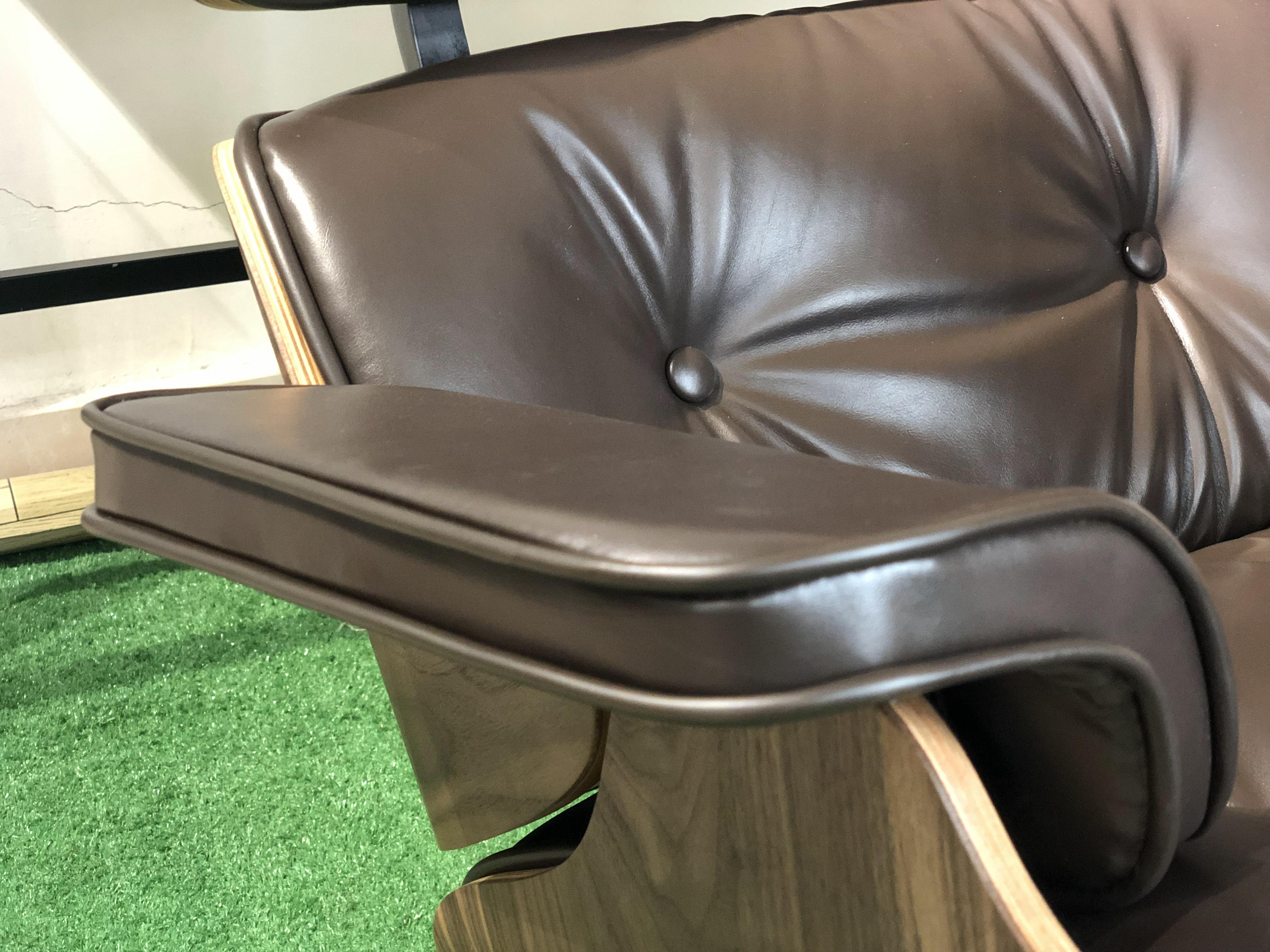 Eames Lounge Chair with leather, walnut
